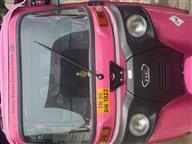 Handing Over Pink Auto to beneficiary